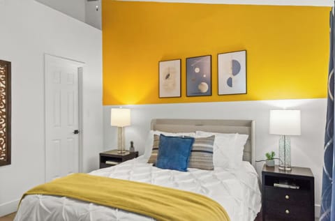 Modern comfort meets timeless style in this inviting bedroom space.