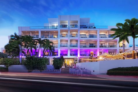 Enter a glowing, resort-style escape lit beautifully at dusk.