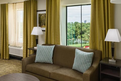 Lounge by bright windows and enjoy peaceful treetop views.
