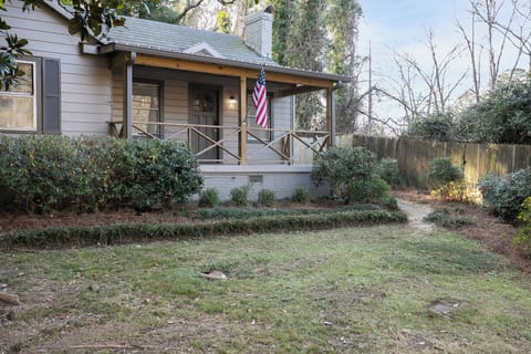 Welcome to The Grove at 21st | Wooded Gazebo Retreat—a single-level Southside home offering the perfect blend of city access and a tucked-away, nature-filled escape