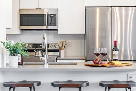 Kitchen: Bright and airy space, perfect for culinary adventures with family and friends!