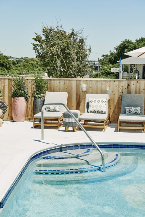 Unwind in bubbling warmth after a perfect pool day.