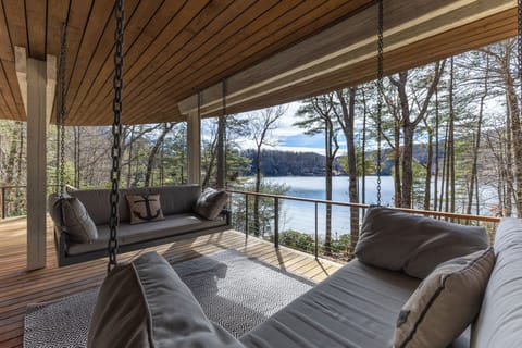 Swinging daybeds overlooking Lake Glenville