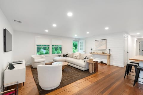 Original wood floors & shiplap entryway add charm and warmth as you walk inside