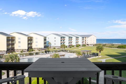 Bird’s Nest: balcony views over pool and ocean just steps from private beach access

