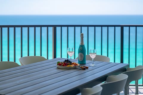 Stunning Gulf views from your spacious private balcony with al fresco dining for 8. Enjoy sweeping views of St. Andrews State Park and Shell Island while dining above the emerald waters.