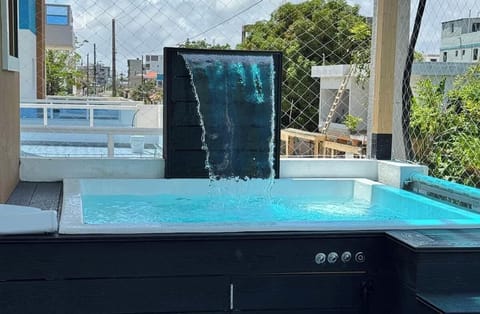 Room temperature water only. Jacuzzi for up to 6 people. 