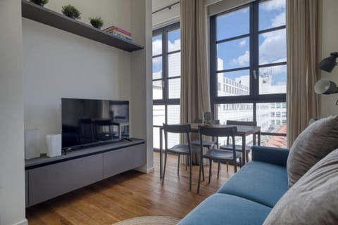 Bright living area with modern design, large windows, and plenty of natural light.
