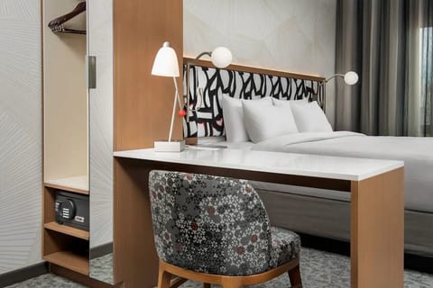 Settle in and work comfortably at the sleek in-room desk.