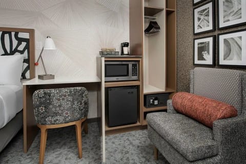 Get productive at the cozy desk with handy in-room essentials.
