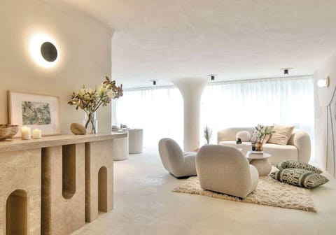 Relax in our cozy, modern, and well illuminated living room. Enjoy your favorite shows on the TV with standard cable and Netflix. The perfect space to kick back and enjoy some downtime!
