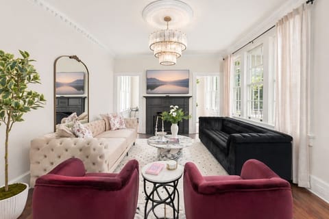 Enjoy this light and airy living room with comfortable plush velvet seating.