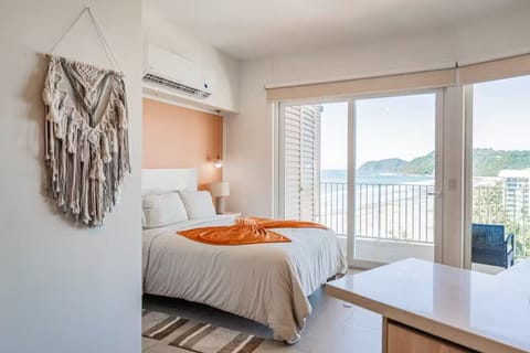 Bright sunny layout with an entire wall of windows