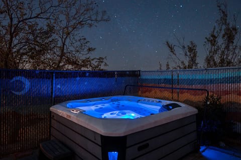 End the night in the hot tub under the stars.