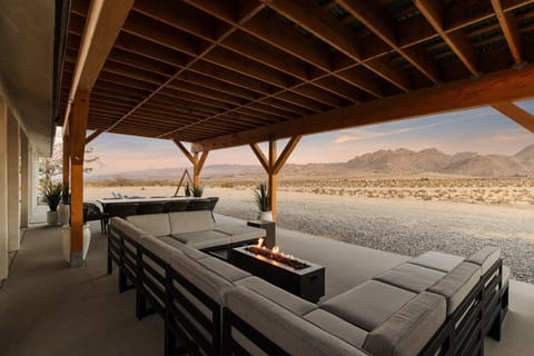 Gather around the fire table with sweeping desert views all around.
