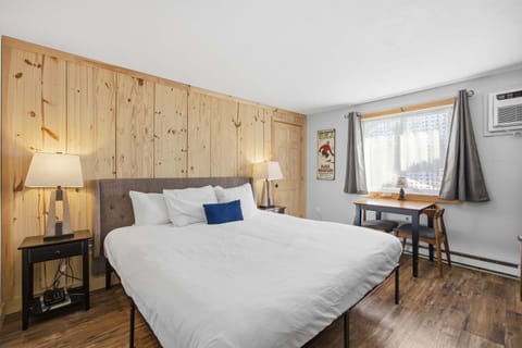 A plush king bed & TV await in this comfortable suite-style home​