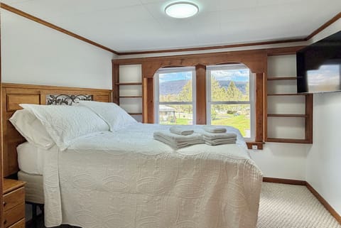 Bright and cozy bedroom with peaceful views