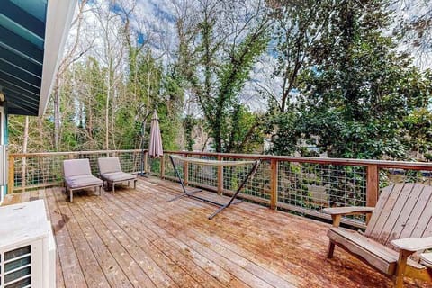 Unwind on your spacious upper deck with a glass of Sonoma County wine — Adirondack seating and a lounger await under the redwood canopy just steps from your door.