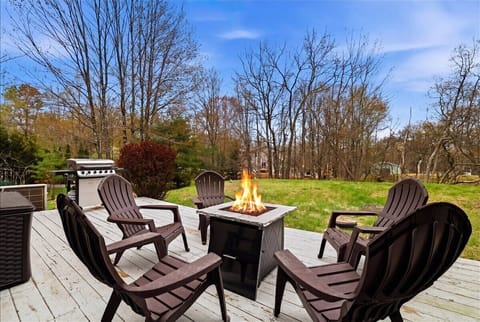 Evenings on the deck are made for the gas fire table, adirondack chairs, and good company under the open sky