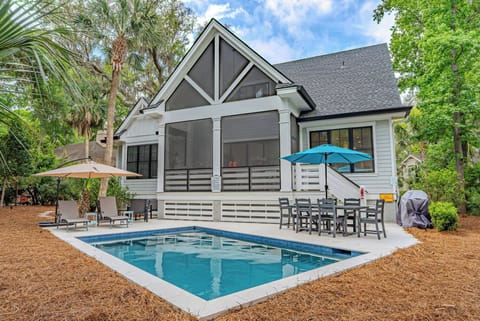 Backyard with a private pool for relaxing and cooling off!