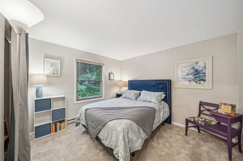 Enjoy a lovely night's stay in the queen bed in this artsy lower bedroom.