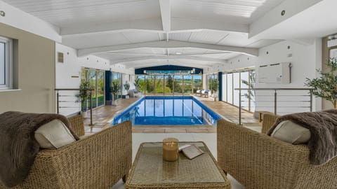 A stylish, heated indoor pool on-site