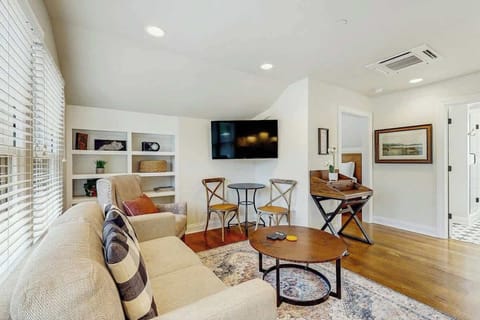 Living Room, bright space with stylish decor, a cozy sofa, and a perfect spot for morning coffee!