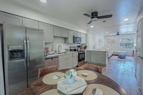 Dining room and kitchen connected for easy meals and gatherings.