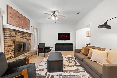 Settle into this comfortable living space with plenty of seating—great for movie nights or catching a big match during your stay in Irving.