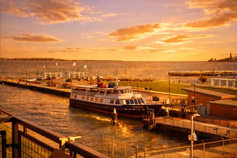 Private Balcony - Golden Lake Erie sunsets paint the sky as boats glide into the marina below. Enjoy front-row harbor views from your private balcony and soak in Sandusky’s waterfront charm.