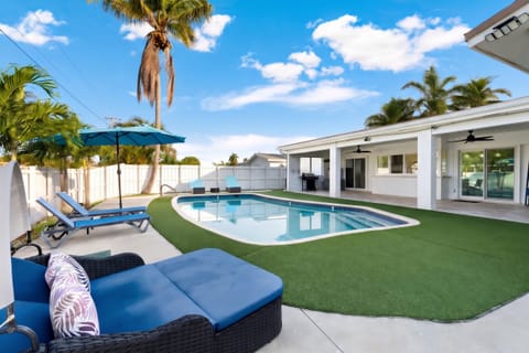 
Your private tropical oasis, complete with a sparkling pool and lounging areas.