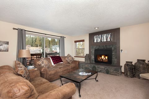 Living Room with Gas Fireplace, Slider to Balcony