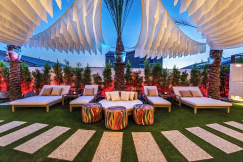 Unwind beneath our signature floating shade sails as they sway gracefully in the desert breeze, creating a unique resort-style lounging experience