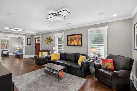Spacious lounge w/ sectional seating, patio access & natural light