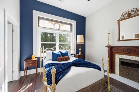 The luxurious bedroom suite boasts a regal queen bed & ensuite bath​