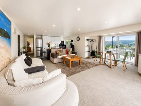 Open-plan living with scenic views and indoor outdoor flow