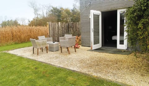 Sip morning coffee outside on your private garden terrace.
