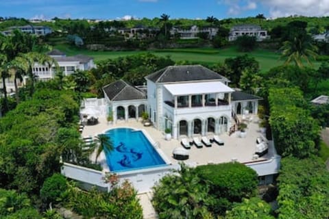 With its extensive grounds Mango Walk is a spacious property with a private pool, gazebo, games room and shared tennis courts.