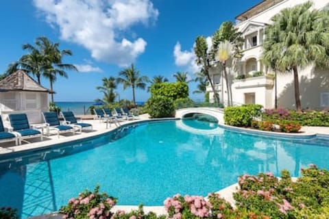 Well maintained communal pool and garden area.