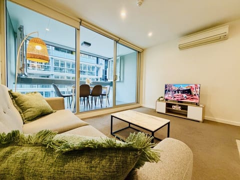 Modern Adelaide CBD apartment with private balcony, Smart TV and self check-in.