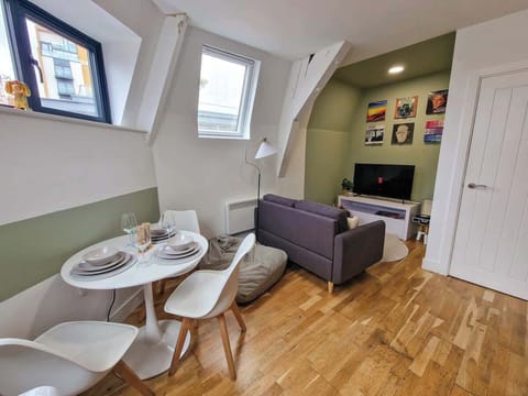 Kick back on the sofa and stream your favourites on the big screen in your stylish loft living space