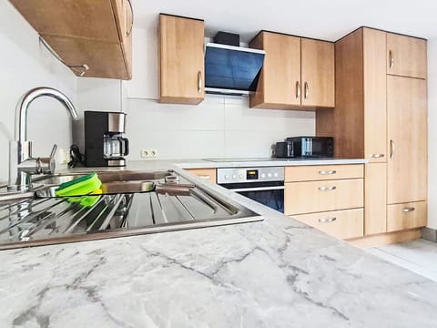 Kitchen, Countertop, Kitchen Appliance, Flooring, Furniture, Major Appliance, Cabinetry, Wood, Interior Design, Floor