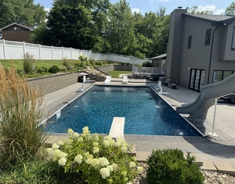 Large in-ground pool, with sundeck, slide & diving board. NO LIFEGUARD on DUTY