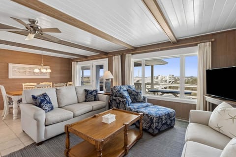 Sunny Living Area with Oceanfront Views and Flat Screen Smart TV