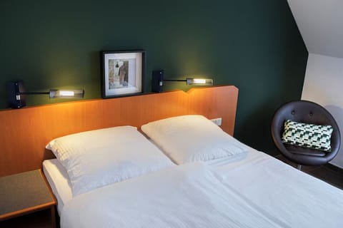 Stretch out on plush pillows under warm reading lights.