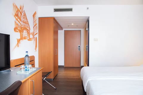 Unwind after adventures in a bright, functional room.