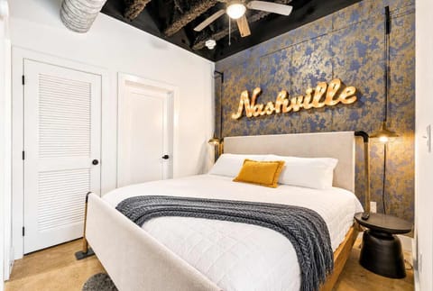 Bedroom: Drift off in a plush king bed, with your own Smart TV, ceiling fan, and ensuite bathroom just steps away.