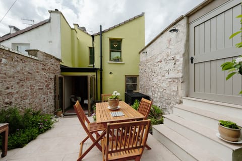 Enjoy outdoor meals with stylish dining furniture in the back garden