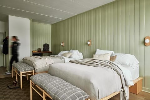 Relax in a spacious bedroom designed for restful group stays.