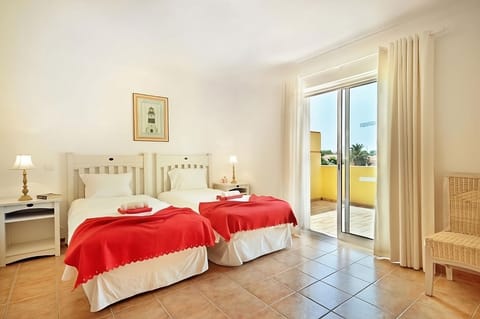 Wake up to sunshine and step onto the airy balcony.
